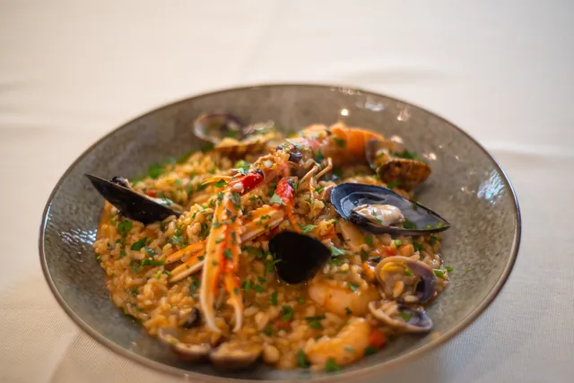 Risotto di mare al momento di uscire in sala